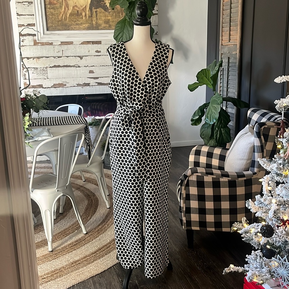 Adorable, polkadot, jumpsuit from anthropology. It has pockets,